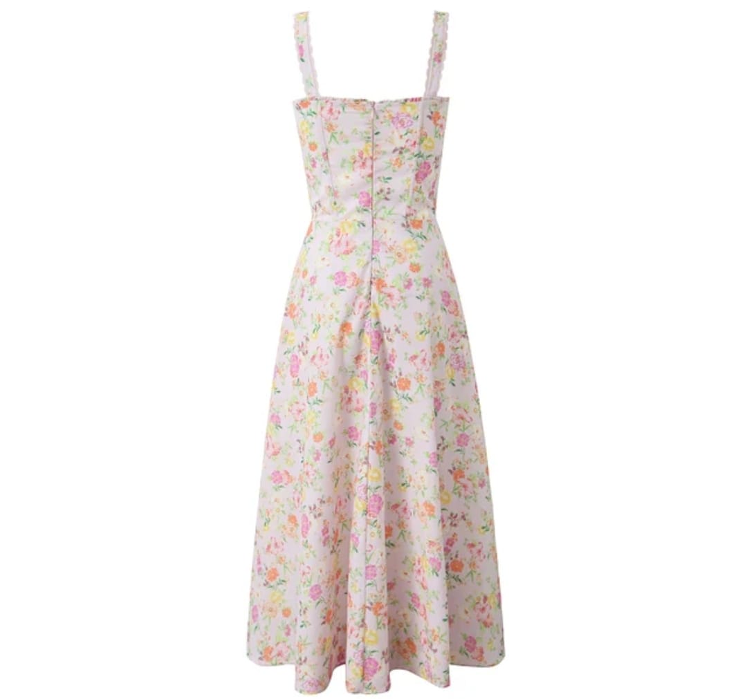 Vestido estampado floral rosado ajustable en el pecho. Talla pequeña