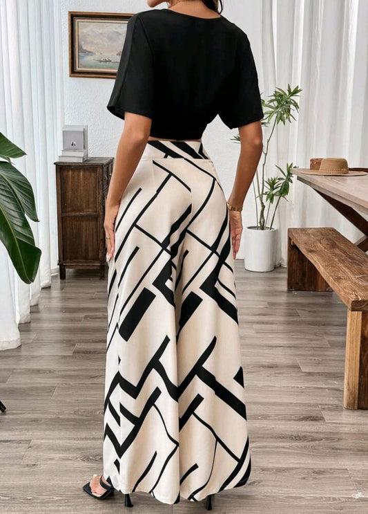 Conjunto top negro con palazzo