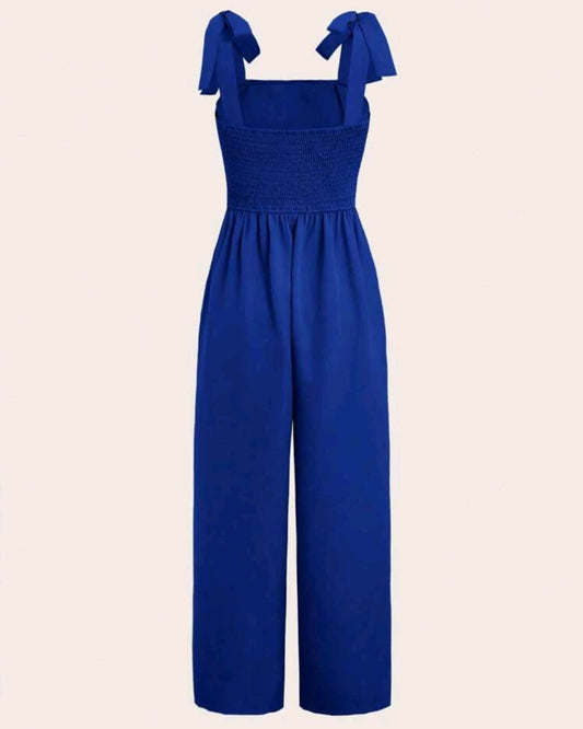 Jumpsuit azul de tirantes de lazo