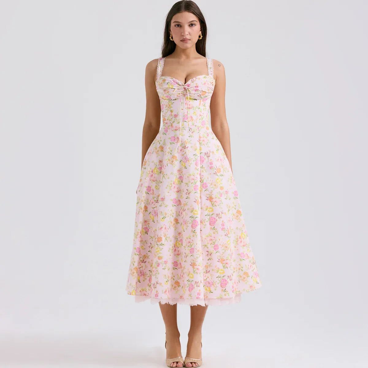 Vestido estampado floral rosado ajustable en el pecho. Talla pequeña
