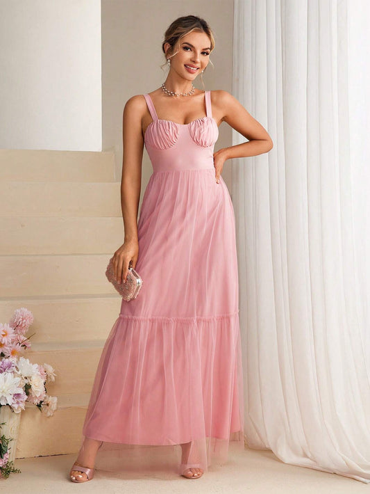 Vestido rosado largo con malla en falda
