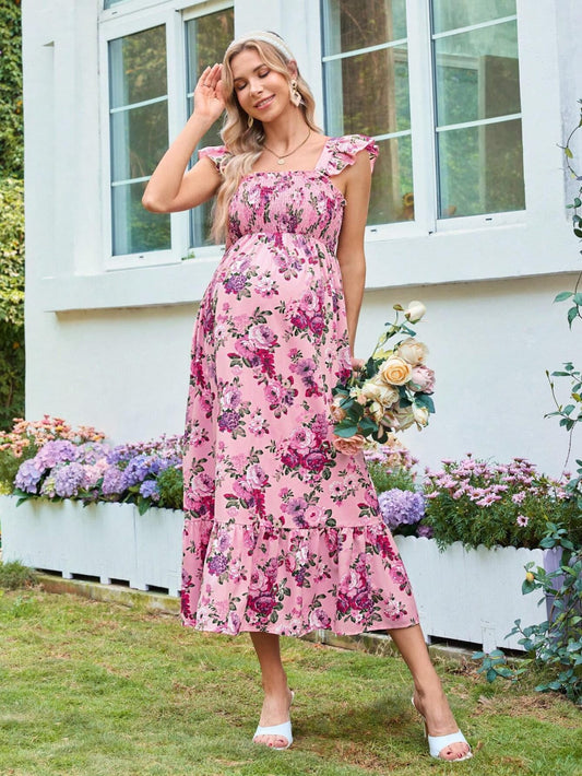 Vestido maternidad rosa con estampado floral largo