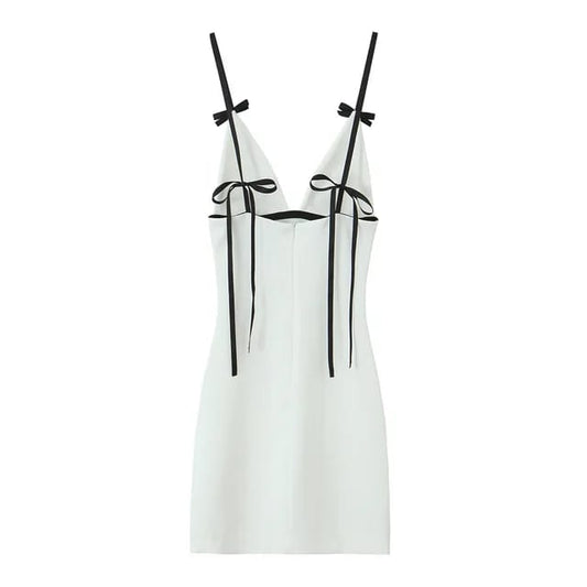 Vestido blanco con tirantes negros. Talla Pequeña