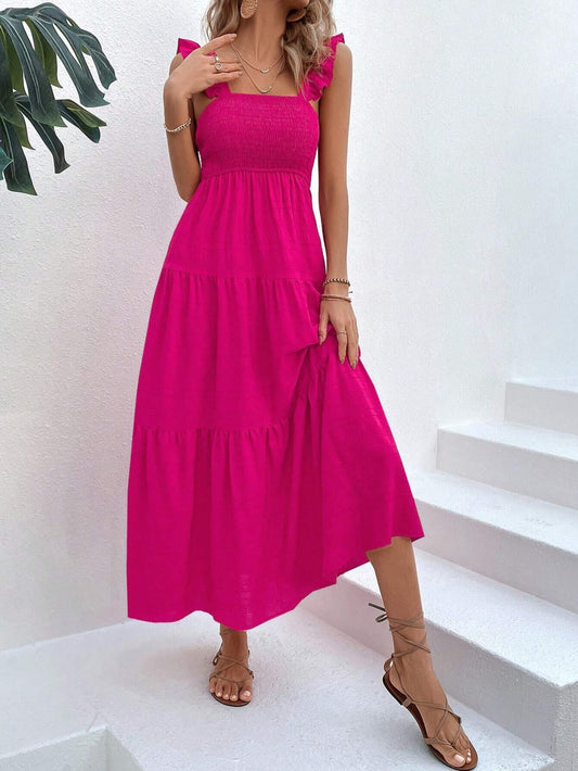 Vestido línea  unicolor bajo con fruncido fucsia largo