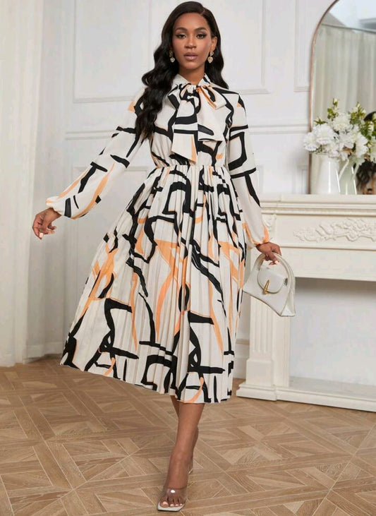 Vestido manga larga estampado negro con naranja