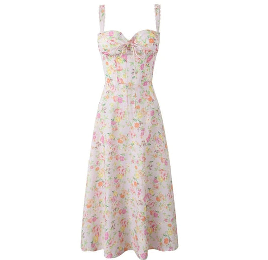 Vestido estampado floral rosado ajustable en el pecho. Talla pequeña