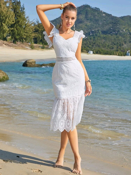 Vestido blanco playero bordado midi