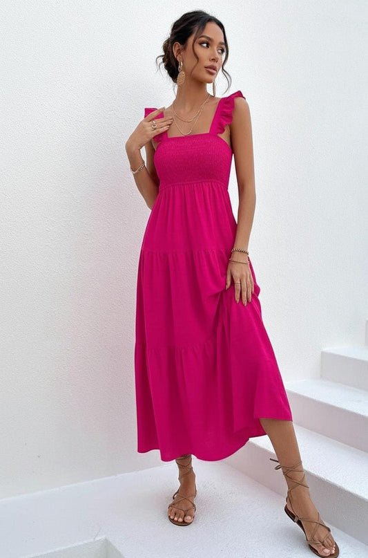 Vestido línea  unicolor bajo con fruncido fucsia largo