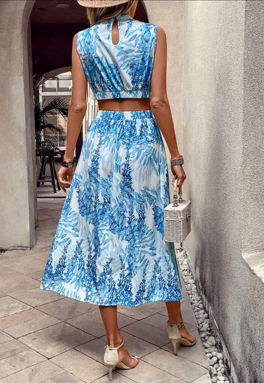 Vestido midi estampado celeste abertura en cintura