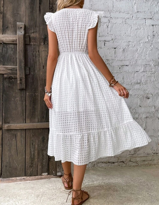 Vestido blanco pierna abierta