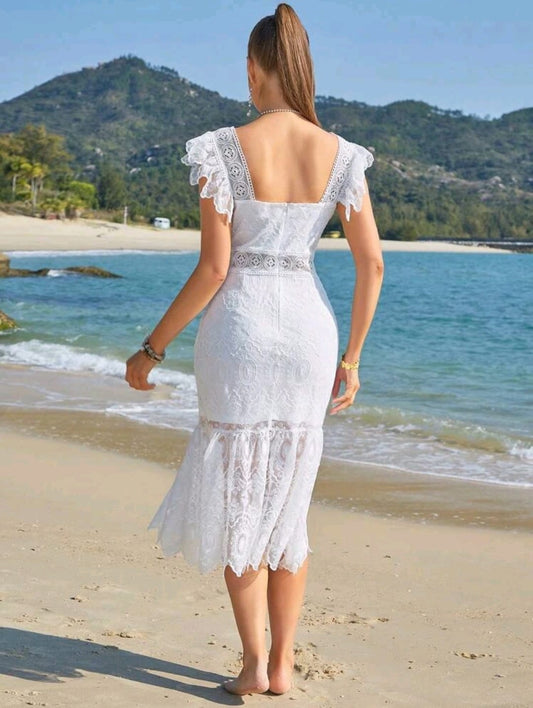 Vestido blanco playero bordado midi