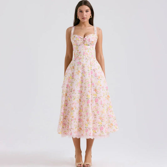 Vestido estampado floral rosado ajustable en el pecho. Talla pequeña